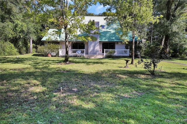 view of yard with a porch