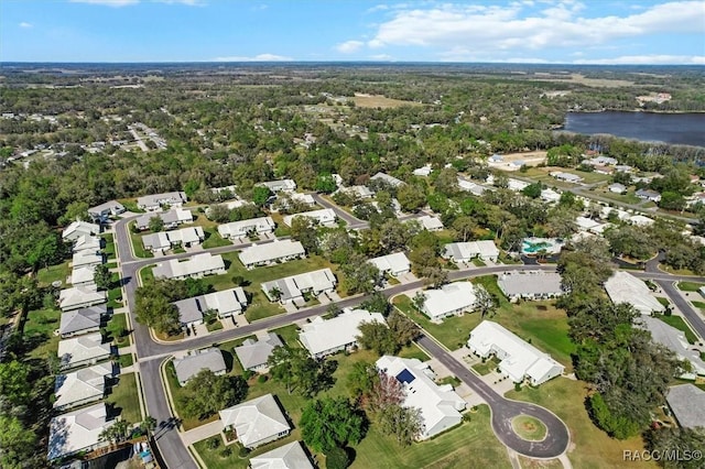 bird's eye view featuring a residential view and a water view