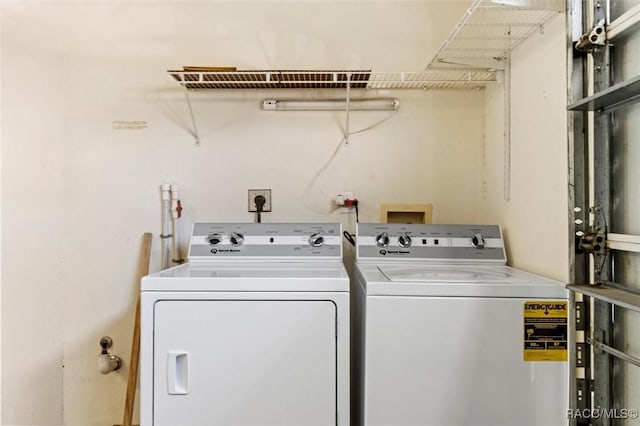 laundry room with laundry area and separate washer and dryer