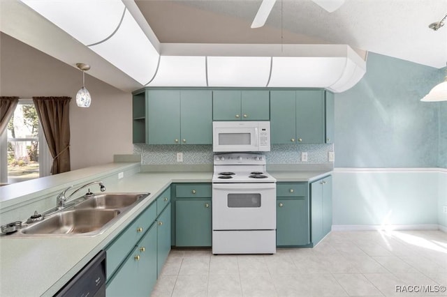 kitchen featuring a sink, white appliances, tasteful backsplash, and light countertops