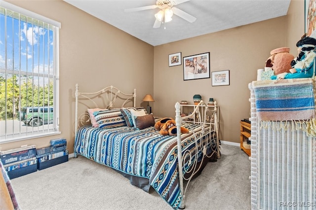 bedroom featuring carpet and ceiling fan