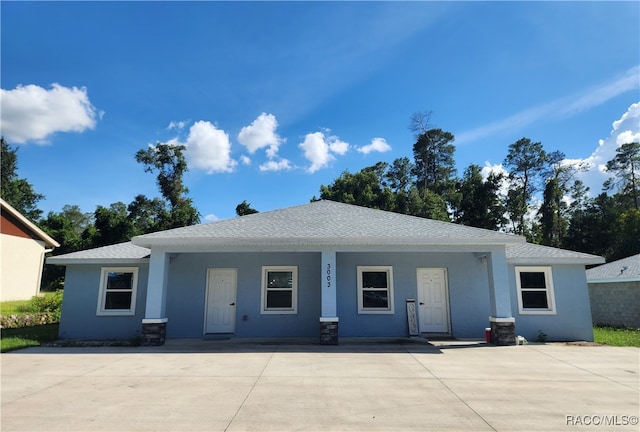 view of front of home featuring covered porch