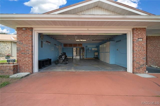 garage featuring driveway