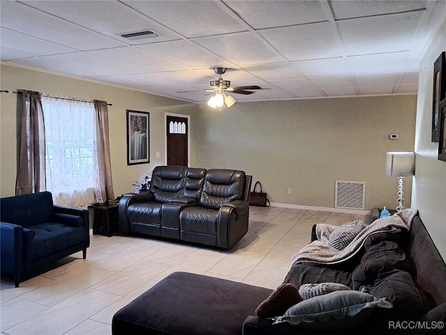 tiled living room featuring a paneled ceiling and ceiling fan