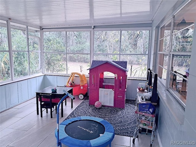 sunroom featuring plenty of natural light