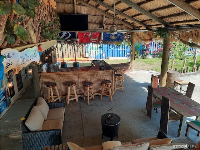 view of patio featuring exterior bar