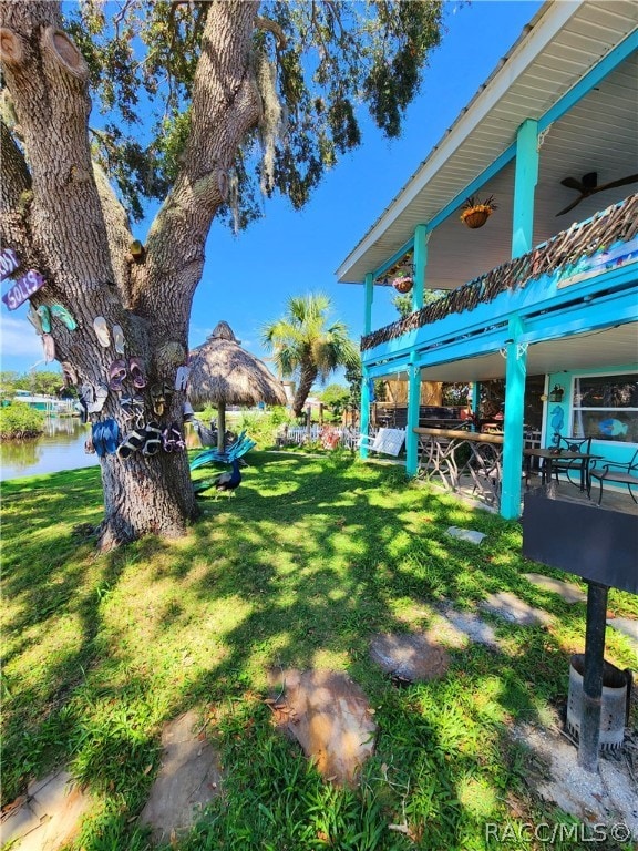 view of yard with a water view