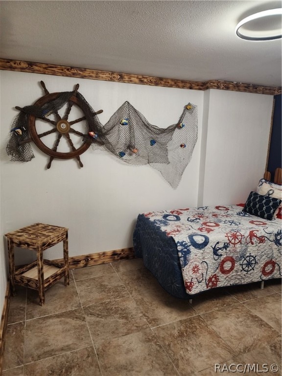 bedroom with a textured ceiling