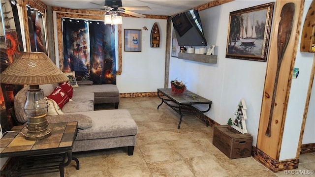 sitting room with ceiling fan