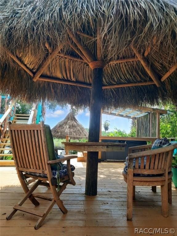 wooden deck featuring a gazebo