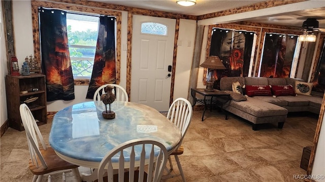 dining room featuring ceiling fan