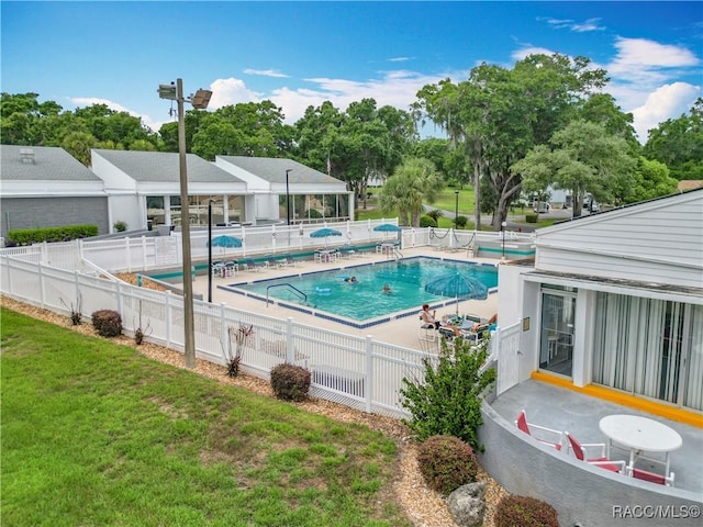 3328 S Whitechappel Pt, Inverness, FL 34452 - community pool with a patio and view of scattered trees