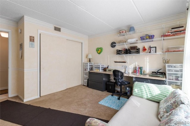 carpeted office featuring a textured ceiling and ornamental molding