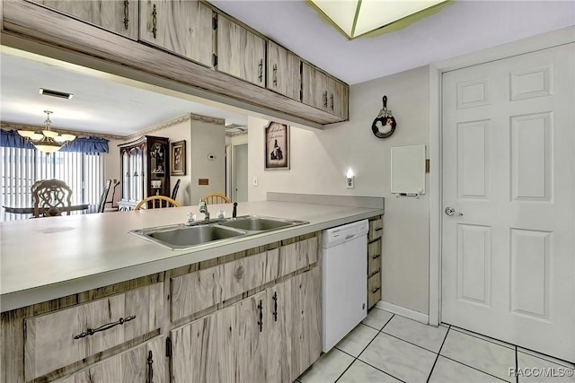 kitchen with pendant lighting, light brown cabinetry, dishwasher, sink, and light tile patterned floors