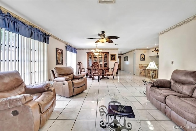 living room with light tile patterned flooring, ceiling fan, and crown molding