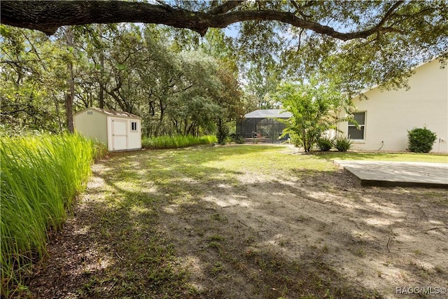 5799 N Oakmont Dr, Beverly Hills, FL 34465 - view of green lawn featuring a shed and a carport
