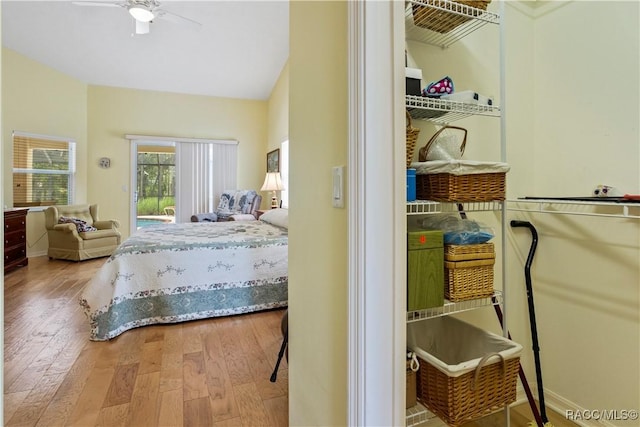 5799 N Oakmont Dr, Beverly Hills, FL 34465 - bedroom with hardwood / wood-style flooring, access to exterior, and a ceiling fan