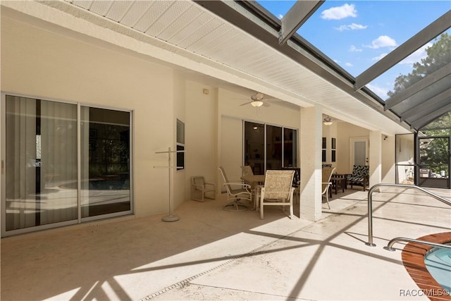 5799 N Oakmont Dr, Beverly Hills, FL 34465 - view of patio with ceiling fan, outdoor dining space, and a lanai