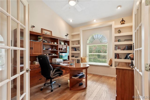 5799 N Oakmont Dr, Beverly Hills, FL 34465 - home office with french doors, a ceiling fan, light wood-style flooring, built in features, and high vaulted ceiling