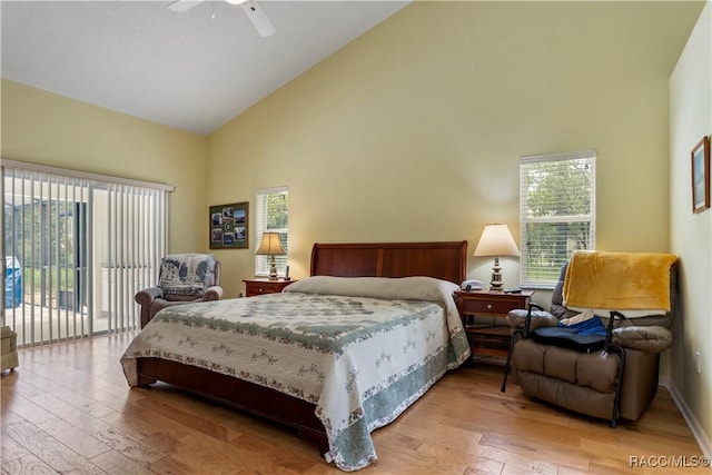 5799 N Oakmont Dr, Beverly Hills, FL 34465 - bedroom featuring high vaulted ceiling, access to outside, light wood-style floors, and ceiling fan