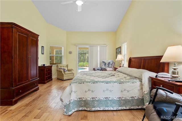 5799 N Oakmont Dr, Beverly Hills, FL 34465 - bedroom with access to exterior, high vaulted ceiling, light wood-type flooring, and ceiling fan