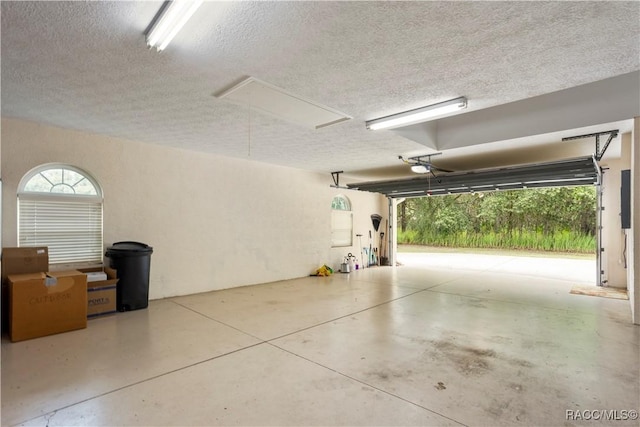 5799 N Oakmont Dr, Beverly Hills, FL 34465 - garage featuring a garage door opener