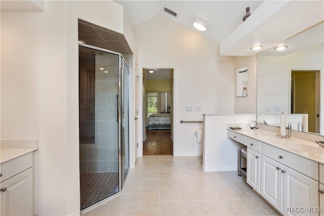 5799 N Oakmont Dr, Beverly Hills, FL 34465 - full bathroom featuring vanity, lofted ceiling, a stall shower, and tile patterned floors
