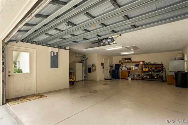 5799 N Oakmont Dr, Beverly Hills, FL 34465 - garage with a garage door opener, electric panel, and water heater