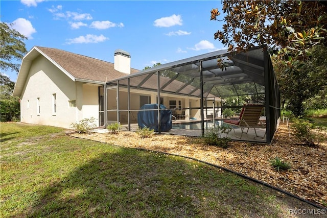 5799 N Oakmont Dr, Beverly Hills, FL 34465 - rear view of house with a chimney, a patio area, stucco siding, an outdoor pool, and a yard