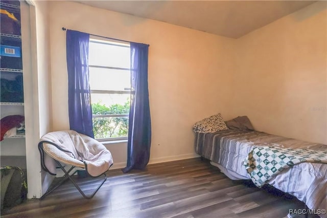 bedroom featuring dark hardwood / wood-style floors