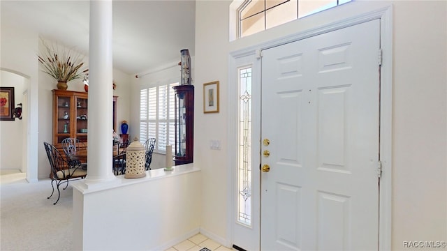 foyer entrance with arched walkways