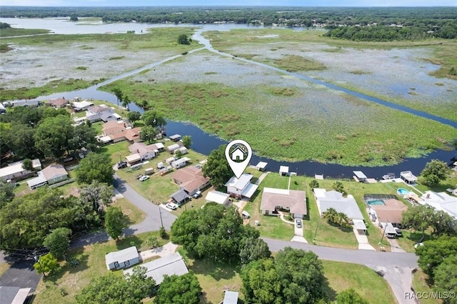 bird's eye view with a water view