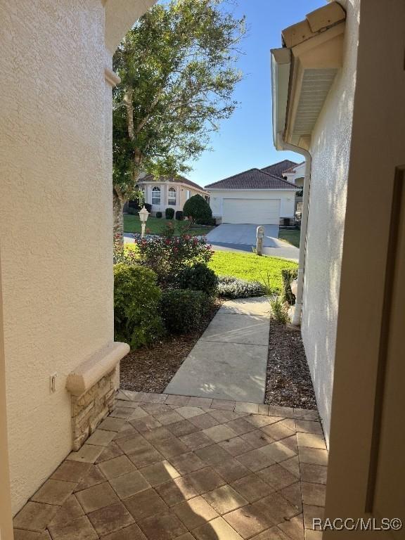 view of patio / terrace with a garage