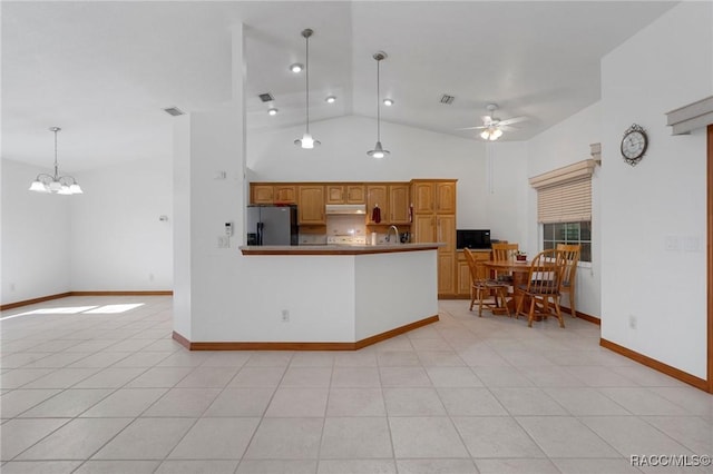 kitchen featuring ceiling fan with notable chandelier, light tile patterned flooring, stainless steel fridge with ice dispenser, and decorative light fixtures