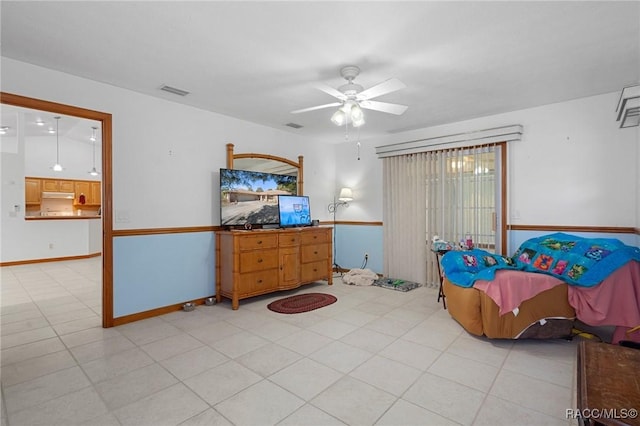 interior space featuring ceiling fan