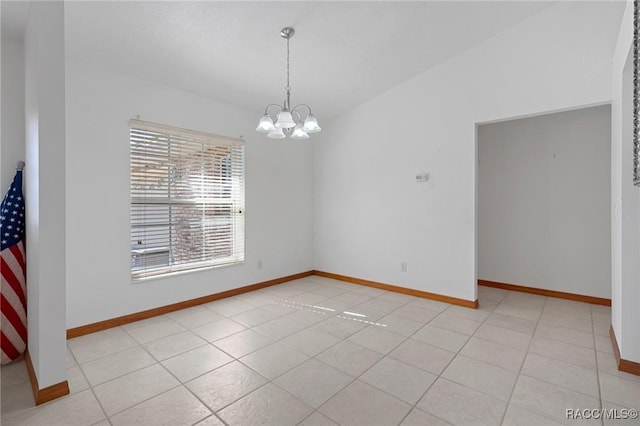 unfurnished room featuring light tile patterned floors and a chandelier