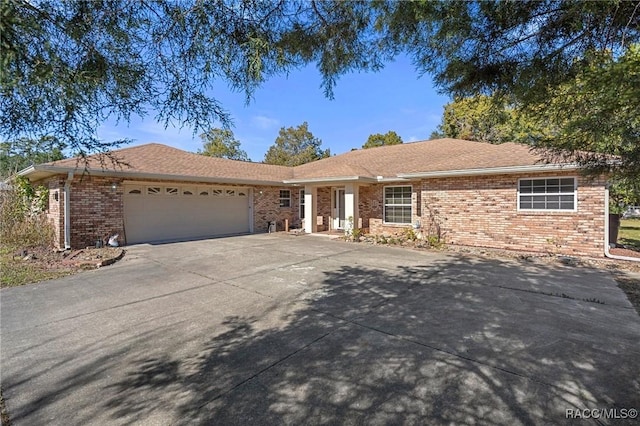 ranch-style home with a garage