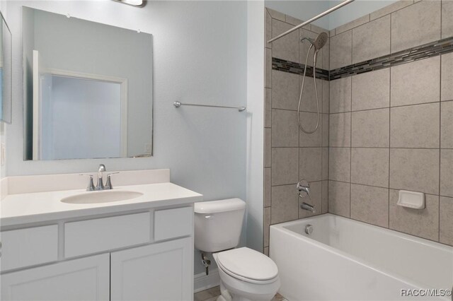 bathroom with an enclosed shower and toilet