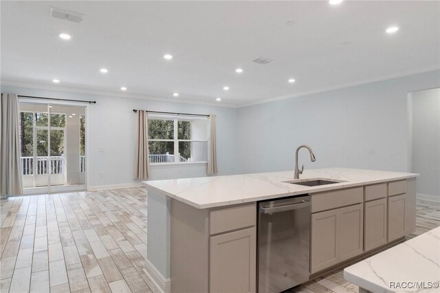 laundry room featuring cabinets, sink, and washing machine and dryer