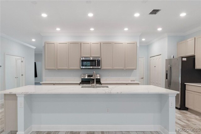 kitchen featuring light stone countertops, stainless steel appliances, light hardwood / wood-style flooring, and crown molding