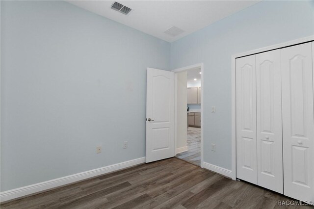 bathroom featuring shower / tub combo and toilet