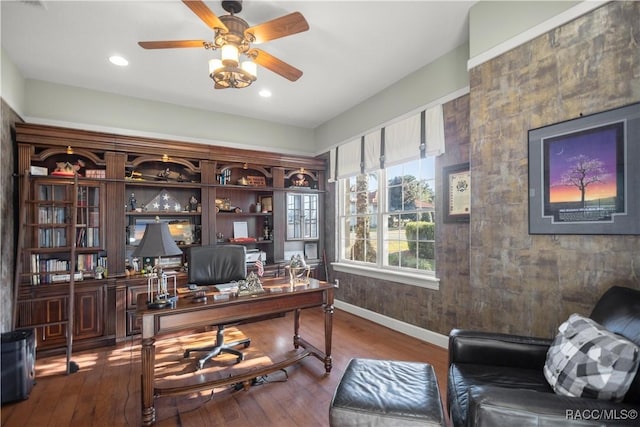 office space with ceiling fan and wood-type flooring