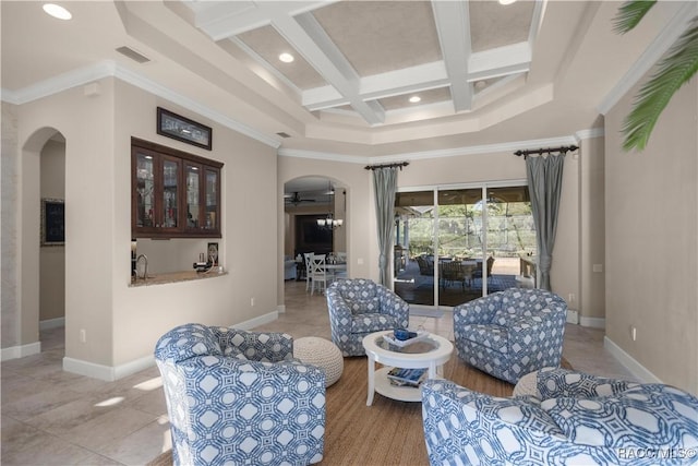 sitting room featuring coffered ceiling, crown molding, ceiling fan, a towering ceiling, and beamed ceiling