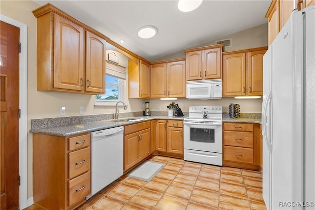9 Flagler Dr, Palm Coast, FL 32137 - kitchen featuring white appliances, a sink, vaulted ceiling, and light tile patterned floors