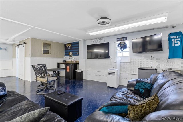 9 Flagler Dr, Palm Coast, FL 32137 - living room with a wainscoted wall and a barn door