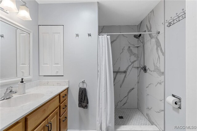 9 Flagler Dr, Palm Coast, FL 32137 - bathroom with a marble finish shower and vanity