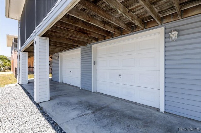 9 Flagler Dr, Palm Coast, FL 32137 - garage with driveway