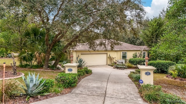 single story home featuring a garage