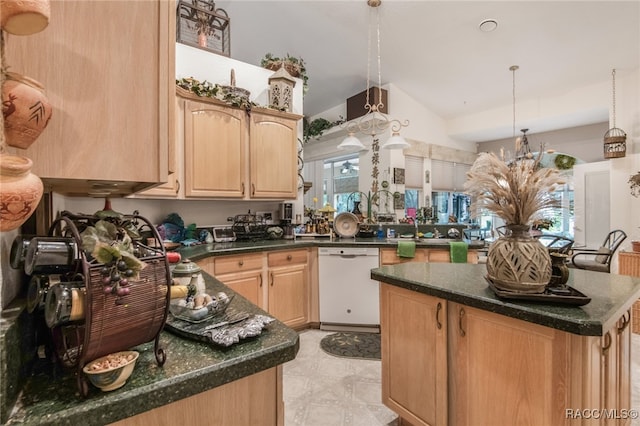 kitchen featuring kitchen peninsula, light brown cabinetry, white dishwasher, pendant lighting, and a notable chandelier