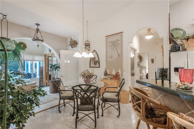 dining area with a chandelier